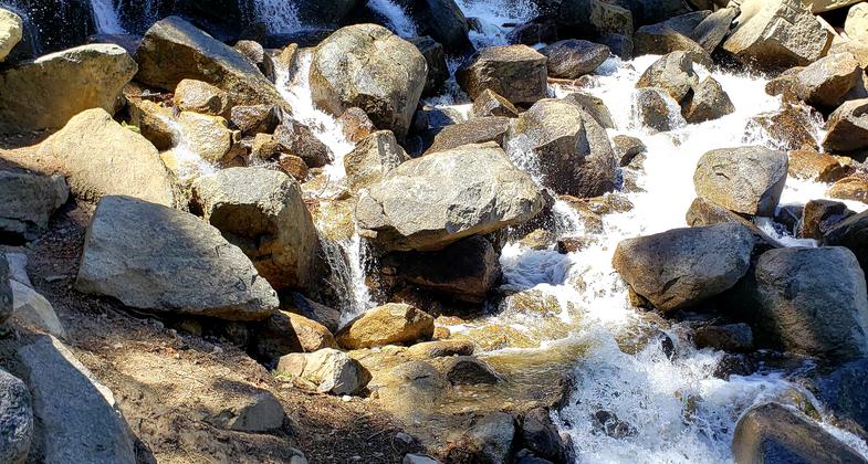Other side of waterfall and rock fall in the past 160 years. Photo by Kris Jennings.