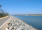Santa Ana River looking upstream near the river mouth. Bike and pedestrian path to left. Photo by Basar.