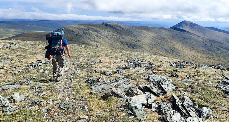 Hiking over Pinnell Mountain toward Porcupine Dome, near Fairbanks Alaska. Photo by Teri Balser.