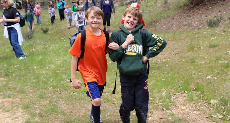 3rd graders immensely enjoying themselves while out trail hiking. Photo by Larry B. Smith.