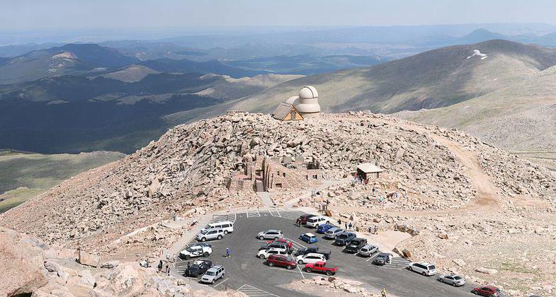 View from the summit of Mount Blue Sky onto the end of the scenic byway and the observatory. Photo by Daniel Schwen/wiki.