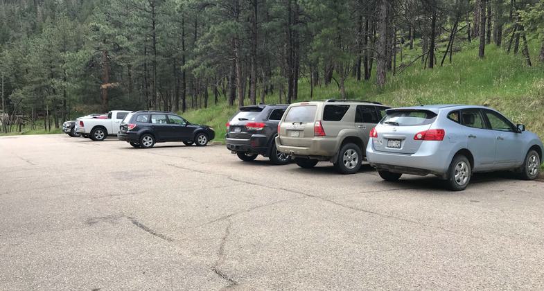 Busy trailhead, limited parking. Photo by Pam Riches.
