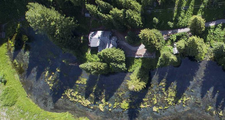 Johnny Sack Cabin from above, at Big Springs, Island Park, Idaho. Photo by wiki James N Perdue.