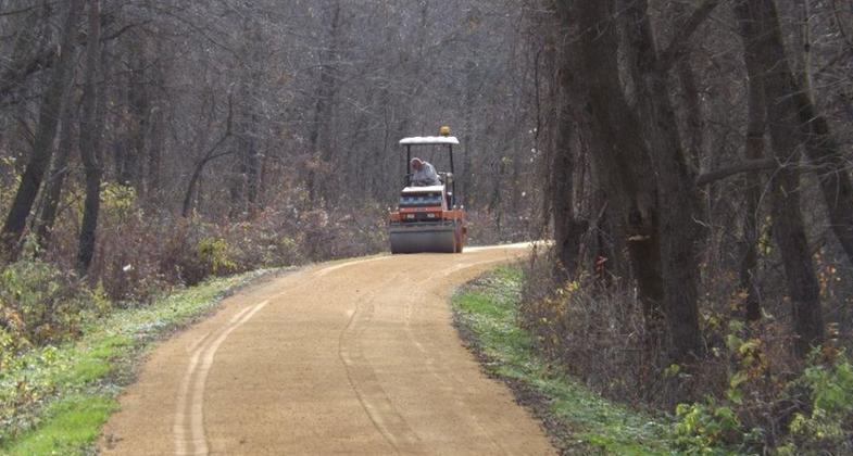 The trail gets a 6 mile new limestone surface every year. Photo by Heritage Trail Dubuque.