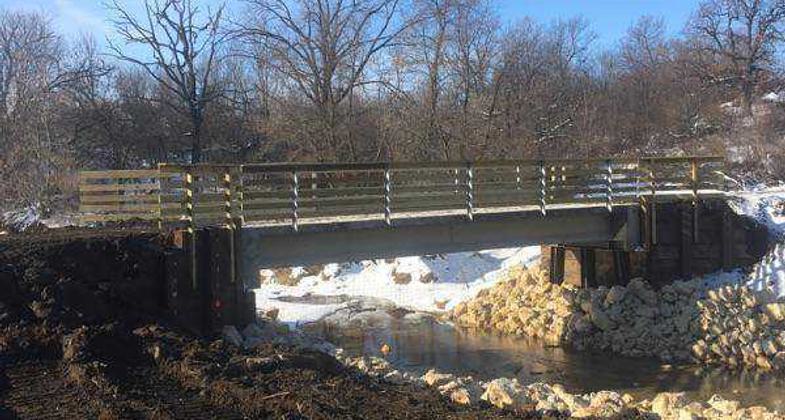 The trail gets a 6 mile new limestone surface every year. Photo by Heritage Trail Dubuque.