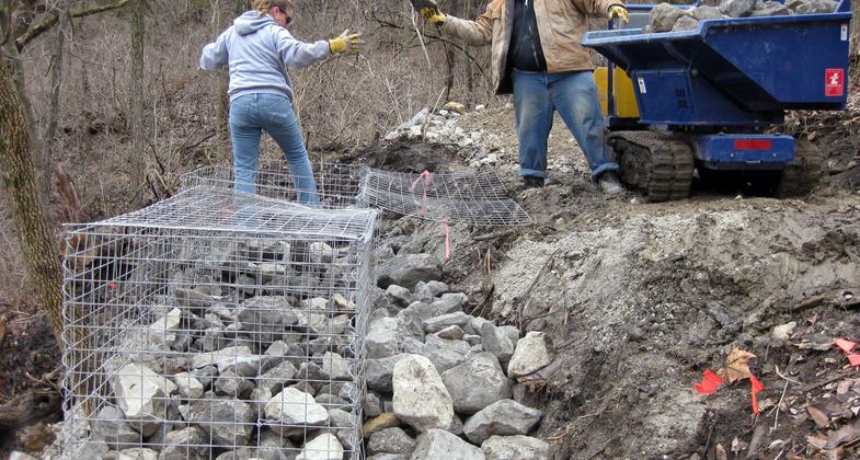 Building a rock gabion wall along the trail. Photo by Kansas DWPT.
