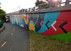 A mural by Silvia López Chavez along the Paul Dudley White bike path on the Charles River Esplanade.