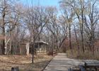 Boardwalk running through woods in fall. Photo by Ammodramus.