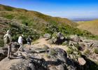Hikers along the upper section of the Hulls Gulch Interpretive Trail. Photo by Larry Ridenhour.
