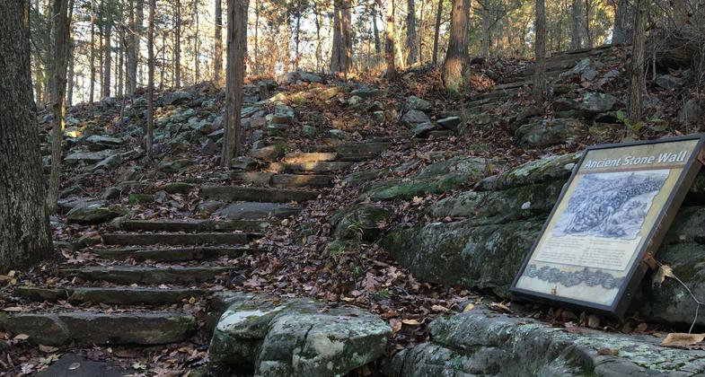 The upper trail passes through a prehistoric stone wall built by Native Americans. Photo by Donna Kridelbaugh.
