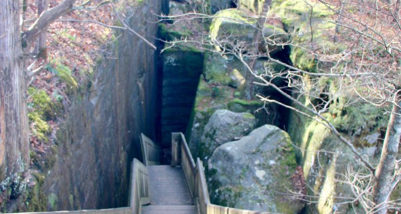 The upper trail passes through a prehistoric stone wall built by Native Americans. Photo by Donna Kridelbaugh.