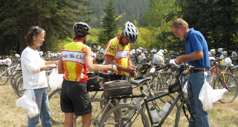 Volunteers work hard to get 575 bicycles parked during the 16th Annual Mickelson Trail Trek. Photo by Brooke Smith.