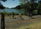 Bicyclists enjoying a ride around Dorena Reservoir along the Row River Trail.