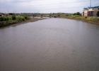 The Raccoon River inDes Moines, Iowa, as viewed upstream from a pedestrian bridge at its mouth at the Des Moines River. Photo by Tim Kiser.