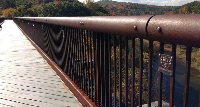 The Rosendale Trestle is 150 feet high, 940 feet long, and an iconic landmark on the trail.