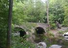 Bridge over the Ten Mile River. Photo by Charles Fulton wiki.