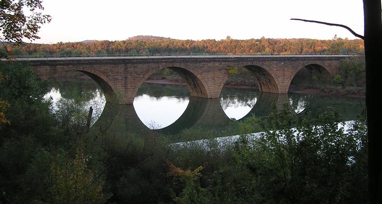 Historic stone arch railroad bridge.