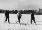 Vintage 1940 ski party crossing  a small frozen lake on one of the ski trails at Shingobee Winter Playground. Photo by Dept of Agriculture/wiki.