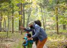 A family stops along the trail at Blevins Gap Nature Preserve to observe. Photo by Lauren Sanderson. Photo by Bob Goodwin