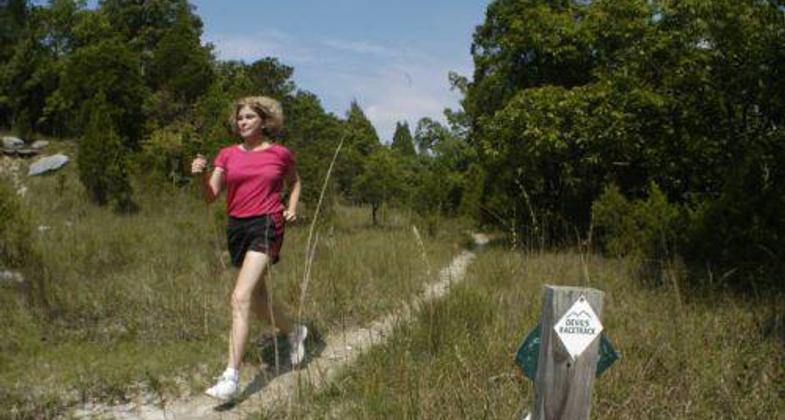 Jogger On Devils Racetrack, Wade Mountain Nature Preserve. Photo by Jerry Green