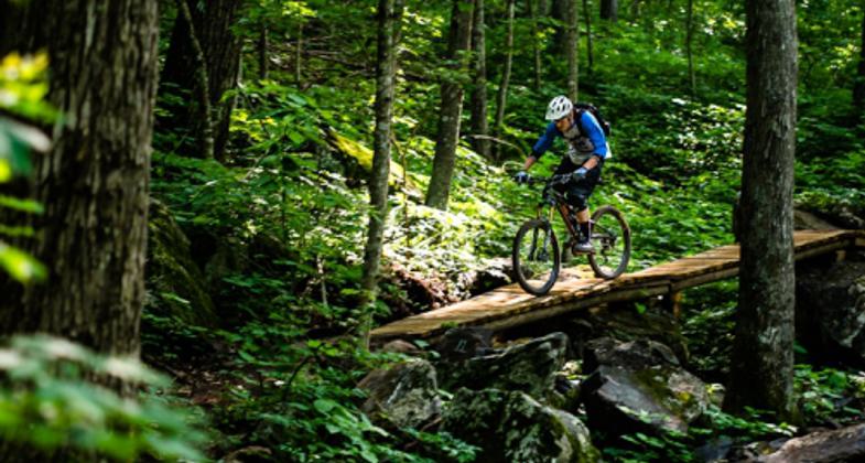 Chad Oliver rides the Stone Binge Skills Area. Photo by Kristian Jackson