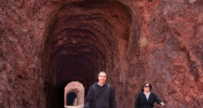 Visitors entering one of five tunnels at Historic Railroad Trail, Lake Mead NRA. Photo by Andrew Cattoir.