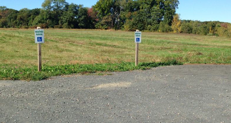 Accessible parking spaces are provided at the head of the Fort River Trail.