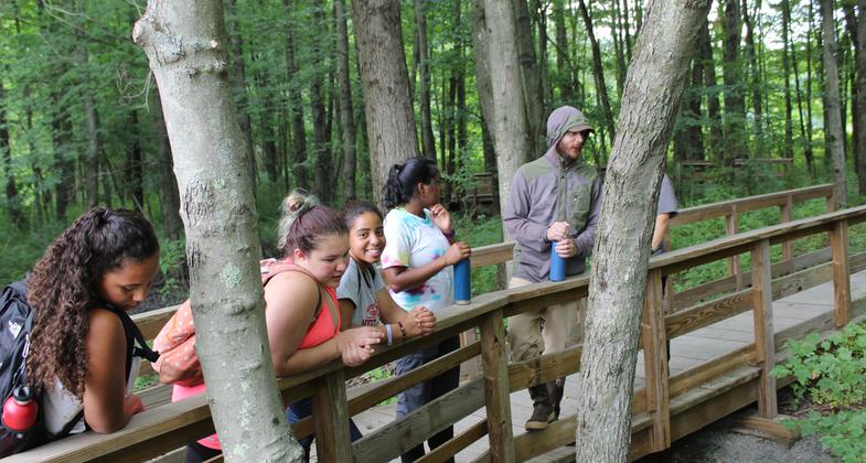 A group of high school students are visiting the trail as part of the Urban Refuge Partnership in Springfield, Mass