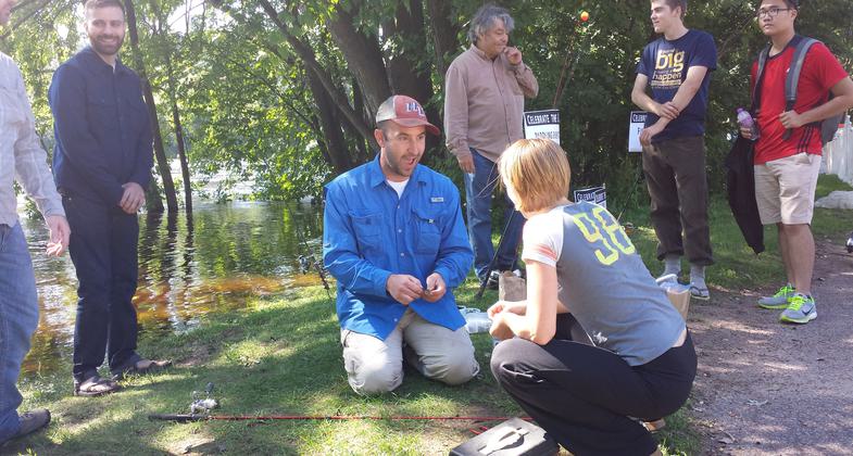 Annual "Celebrate the Chippewa River" event in Eau Claire includes demonstrations on the river's ecosystem including how to catch its inhabitants.