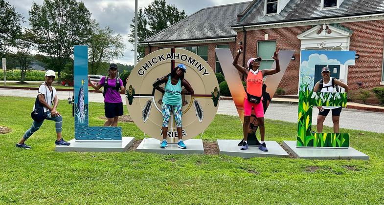 Walkers on the Virginia Capital Trail in the Richmond section near Mile Marker 51.