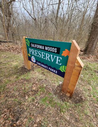Installation of new sign at California Woods. Photo by Cincinnati Park Board.