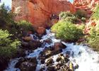 Cascade Falls just below the cave opening, forming the headwaters of the North Fork of the Virgin River. Photo by Lance Weaver, Utah Geo. Survey.