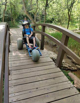 Exploring the Cascade Springs Trail with Extreme Motus all-terrain wheelchair.