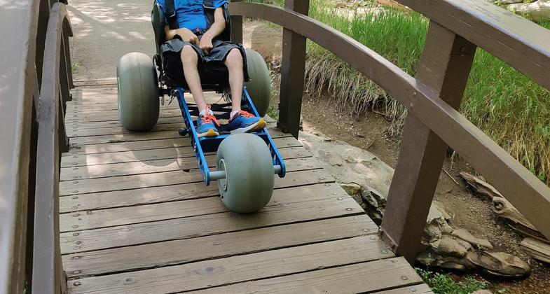 Exploring the Cascade Springs Trail with an Extreme Motus all-terrain wheelchair.