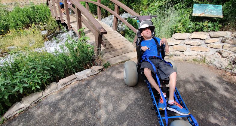 Exploring the Cascade Springs Trail with an Extreme Motus all-terrain wheelchair.