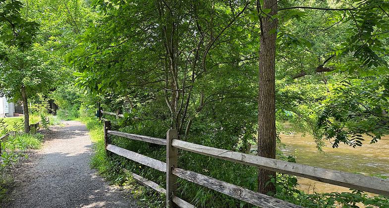 Well-maintained trail by the river. Photo by Janie Walker