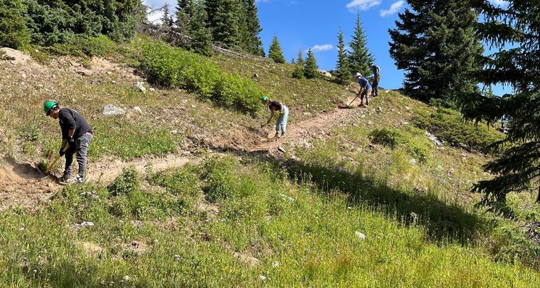 Friends of the Dillon Ranger District volunteers working on the Wheeler Trail in Breckenridge, CO. Photo by Lizzie Morrison.